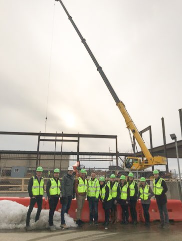 Owner’s representative with project team on construction site